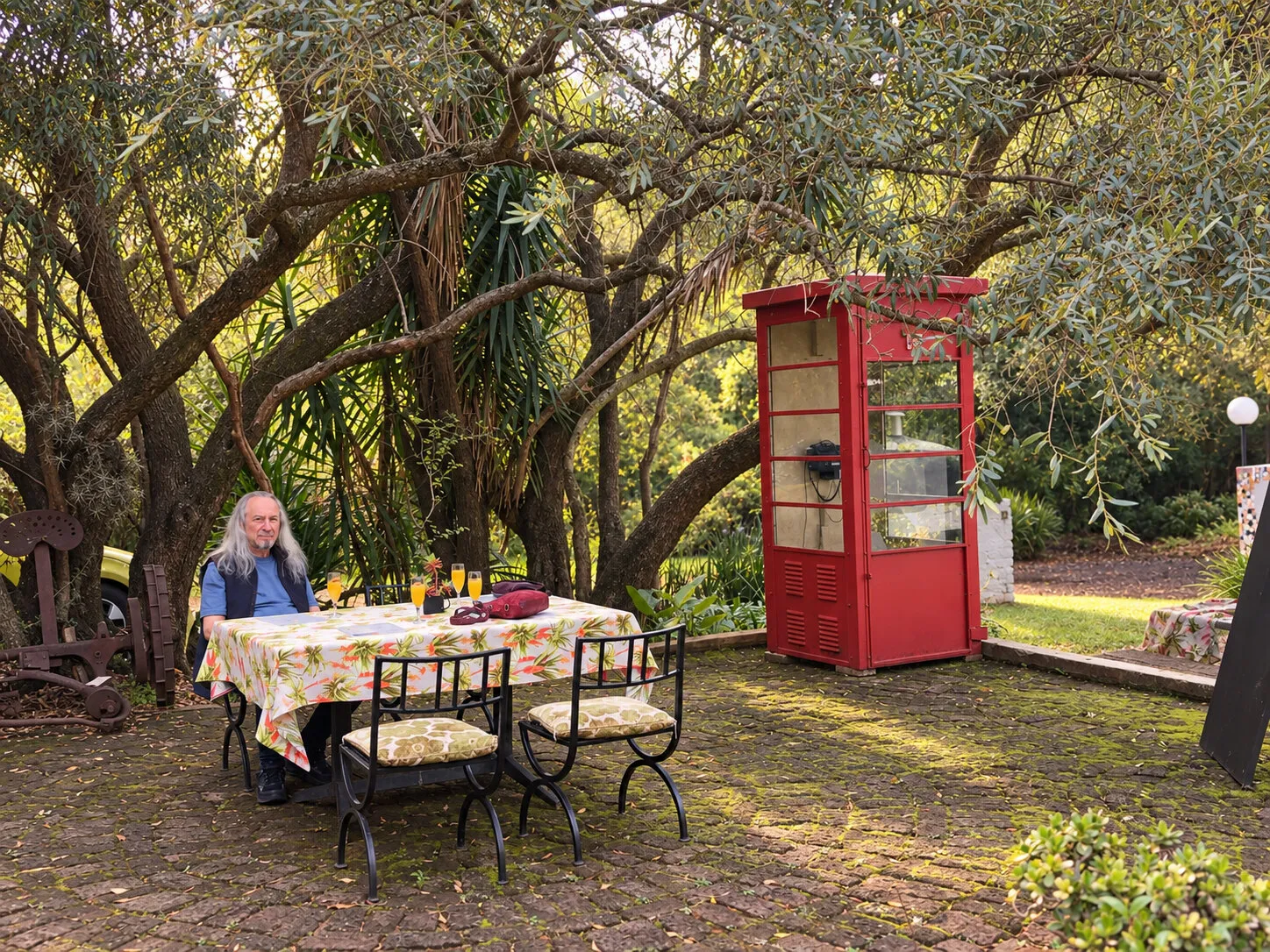 Garden table beneath the trees at MelonRouge