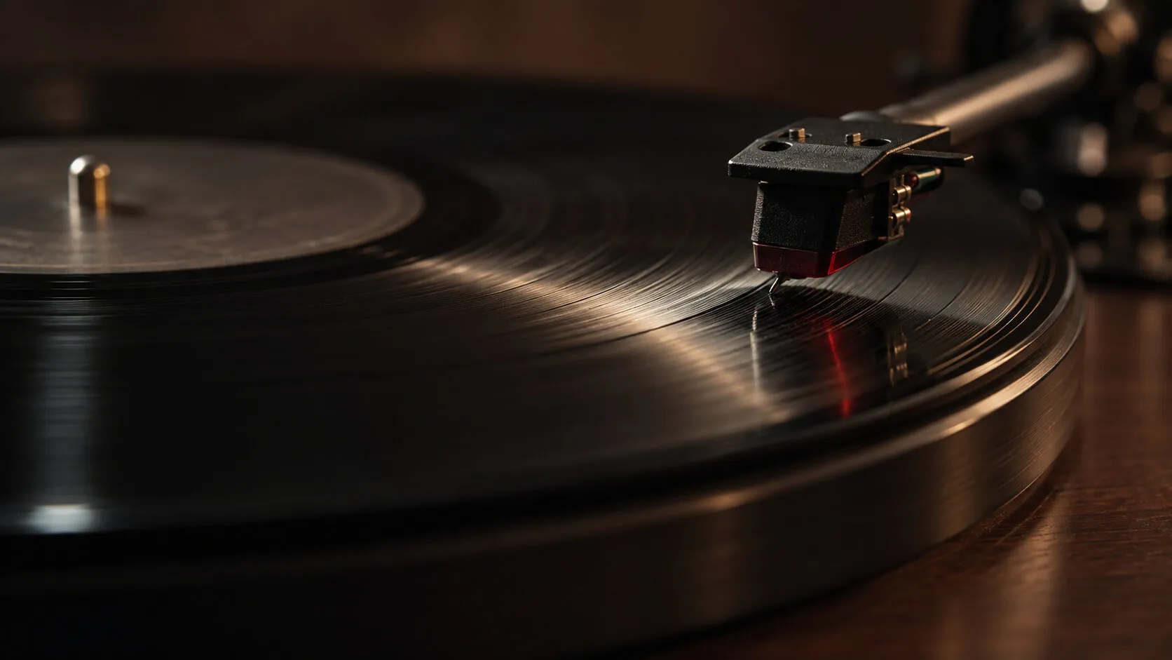 Turntable needle resting on a spinning vinyl record